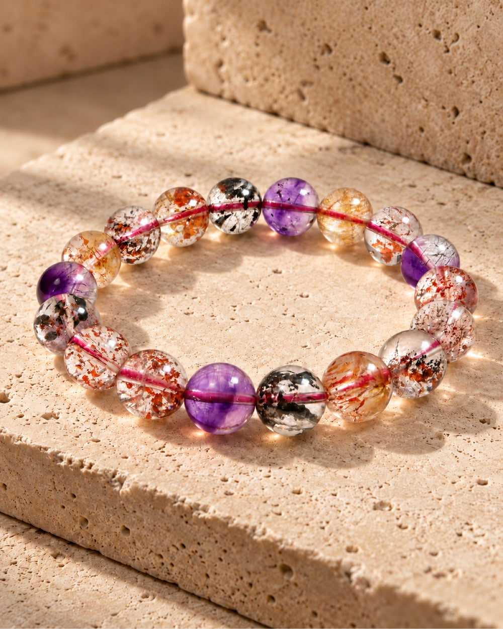 Super Seven bracelet on travertine